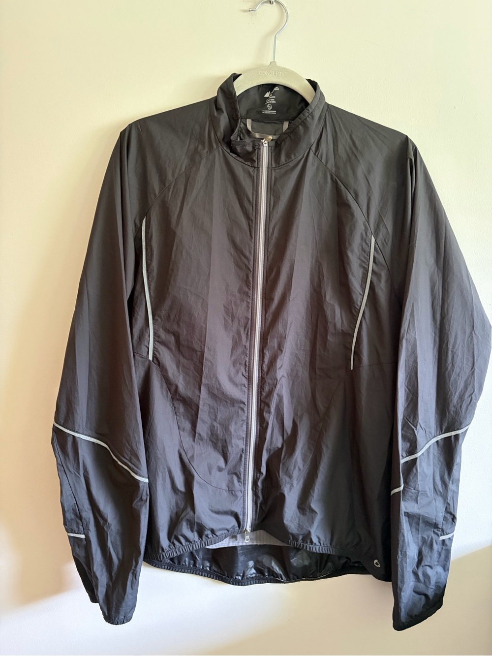 MEC - size medium, black, men’s lightweight, zip-up cycling windbreaker jacket.